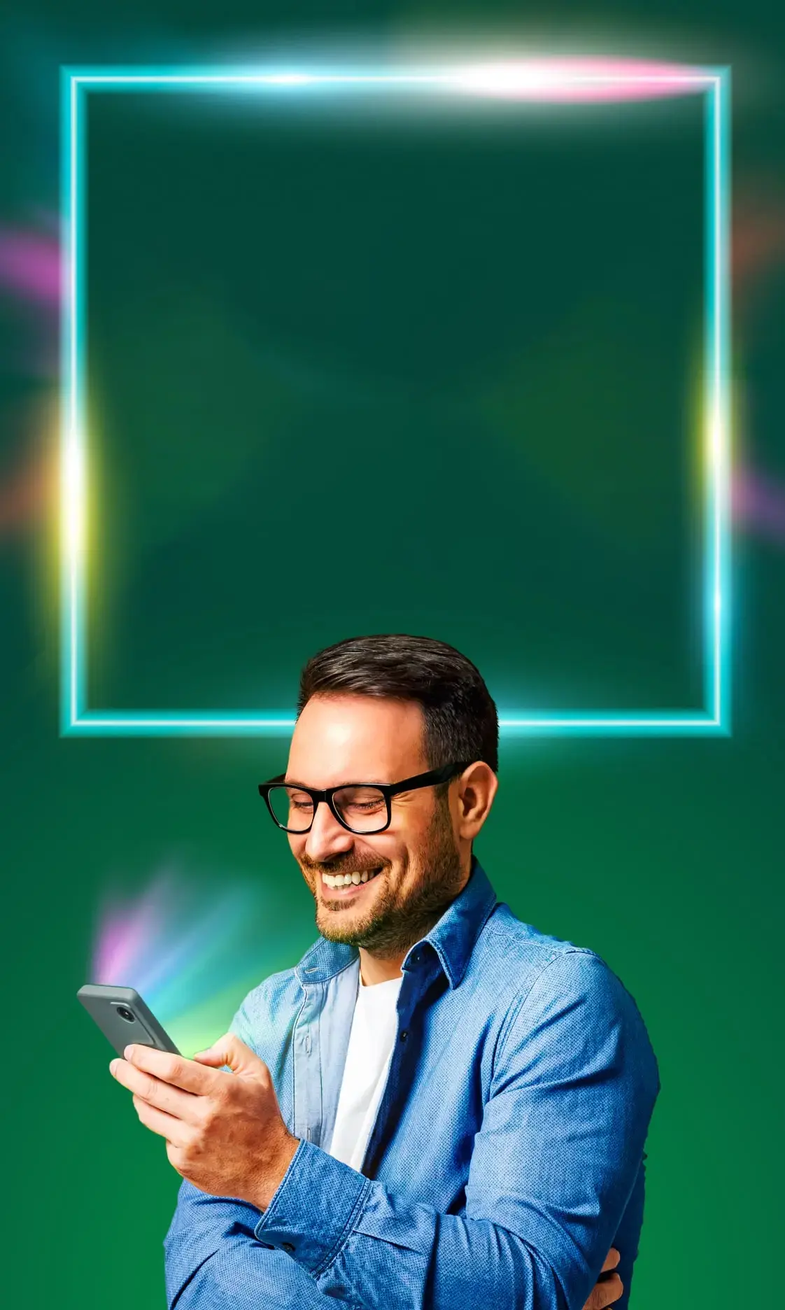 A man smiling at his phone whilst on a Wi-Fi call.